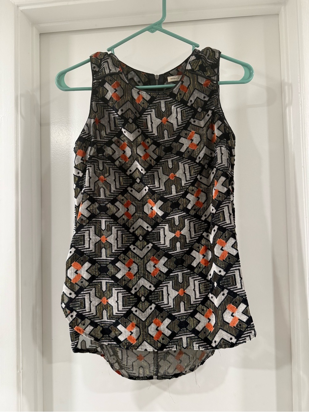 Meadow Rue Black Geometric Embroidered Sleeveless Top with Orange Accents